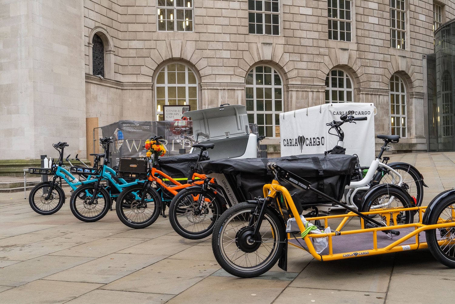 E-cargo bike library in Manchester, launched in February 2022. Credit: <a href='https://ebiketips.road.cc/content/news/manchester-e-cargo-bike-hire-will-cost-just-12-a-day-3565'>road.cc</a>